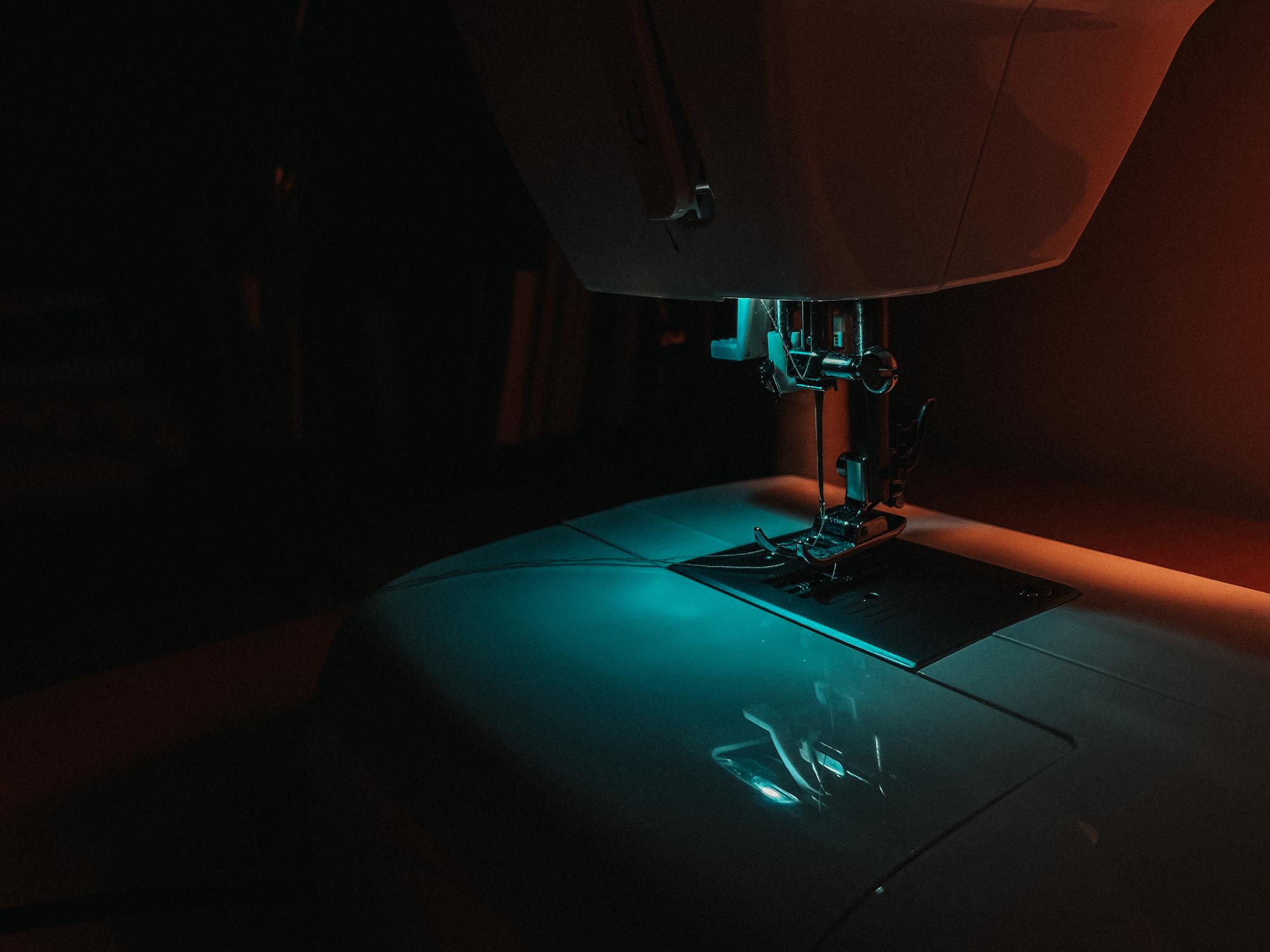 Close-up of machine embroidery on dark fabric